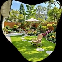 A planted garden with a lawn and a shaded seat